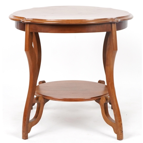 109 - Mahogany centre table with serpentine outline and under tier, 62cm high x 67cm in diameter