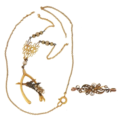 114 - Unmarked gold wishbone and heather necklace set with simulated pearls and an unmarked gold cultured ... 