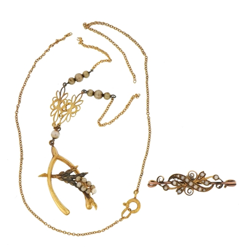 114 - Unmarked gold wishbone and heather necklace set with simulated pearls and an unmarked gold cultured ... 