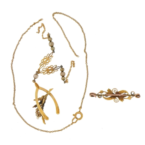 114 - Unmarked gold wishbone and heather necklace set with simulated pearls and an unmarked gold cultured ... 