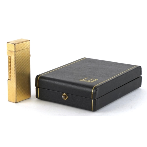 119 - Dunhill gold plated pocket lighter together with a fitted Dunhill case