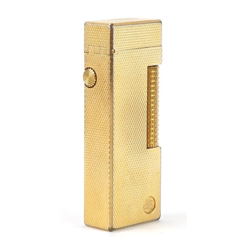 119 - Dunhill gold plated pocket lighter together with a fitted Dunhill case