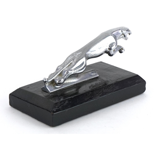 120 - Vintage chrome plated Jaguar car mascot on wooden plinth base, 14cm in length