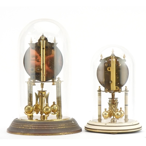 123 - Two brass anniversary clocks housed under glass domes including a Kundo example, the largest 30cm hi... 