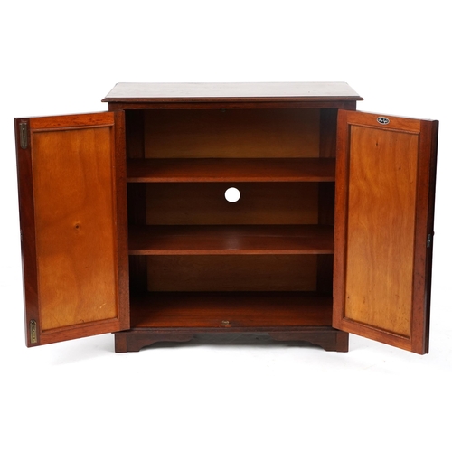 46 - Aw-Lyn, mahogany two door cupboard enclosing three shelves, 78cm H x 75cm W x 36cm D