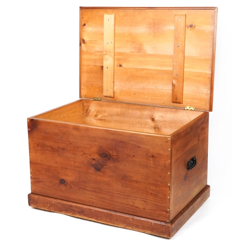 52 - Large Victorian style waxed pine trunk with carrying handles, 60cm H x 95cm W x 62cm D