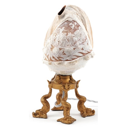 327 - Very fine 19th century conch shell table lamp raised on an ormolu base with dolphin feet, the shell ... 