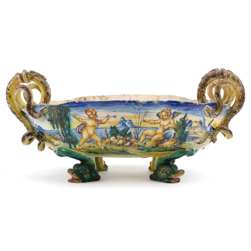 345 - Cantigalli, 19th century Italian Maiolica four footed centrepiece with handles hand painted with Put... 