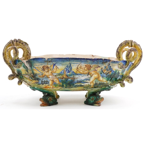 345 - Cantigalli, 19th century Italian Maiolica four footed centrepiece with handles hand painted with Put... 