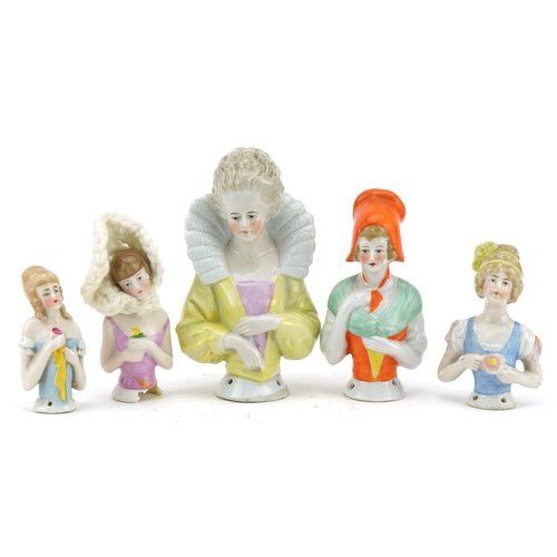 2309 - Five 19th century and later half pin dolls, the largest 11cm high