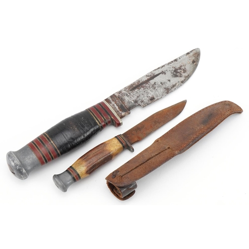 2506 - Military interest commando knife with Sheffield steel blade and a Boy Scout's knife with leather she... 