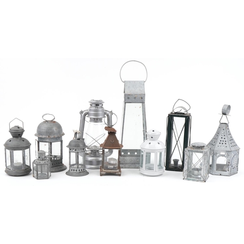 2355 - Collection of metal hanging lanterns and tealight holders, the largest 48cm high