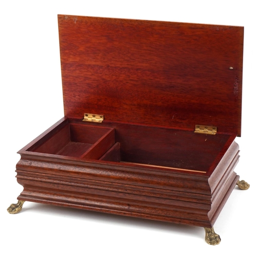 354 - Inlaid mahogany musical jewellery chest on brass paw feet with Reuge music movement, 13cm H x 37cm W... 