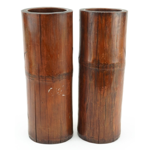 414 - Large pair of oriental Chinese bamboo brush pots carved with elders, 29cm high