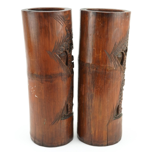 414 - Large pair of oriental Chinese bamboo brush pots carved with elders, 29cm high