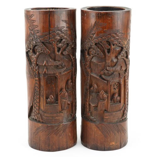 414 - Large pair of oriental Chinese bamboo brush pots carved with elders, 29cm high