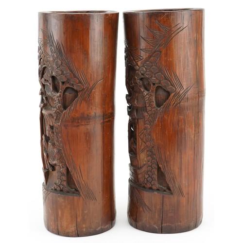 414 - Large pair of oriental Chinese bamboo brush pots carved with elders, 29cm high