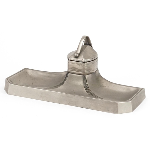 325 - Manner of WMF, Art Nouveau style pewter inkwell with ceramic liner, 25.5cm wide