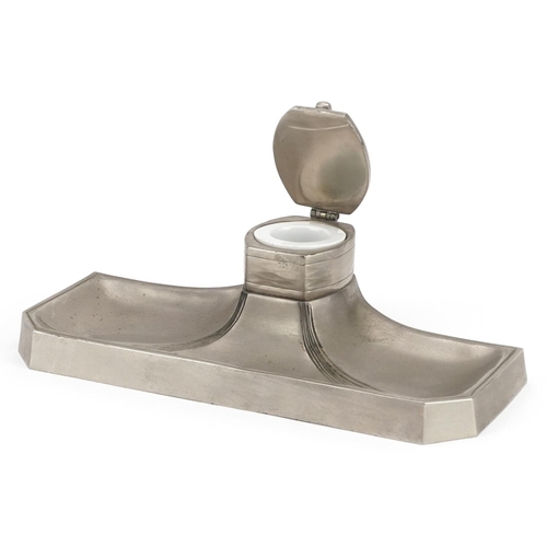 325 - Manner of WMF, Art Nouveau style pewter inkwell with ceramic liner, 25.5cm wide