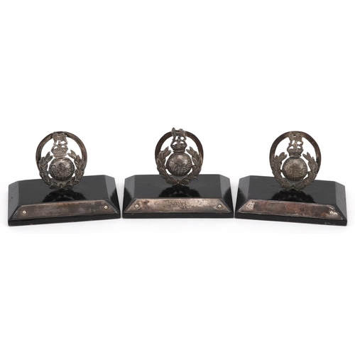 2463 - Three Military interest unmarked silver Royal Marine menu or place card holders, The Goldsmiths & Si... 