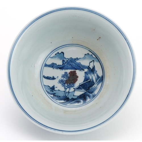 535 - Chinese blue and white with iron red porcelain bowl hand painted with figures in a river landscape, ... 