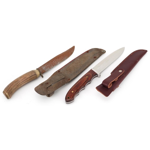 2505 - Horn handled hunting knife housed in a leather sheath and a C. Jul Herbertz hunting knife numbered 1... 