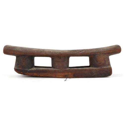 90 - Large African tribal interest wooden headrest, 55cm in diameter
