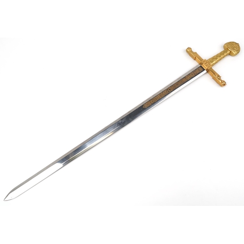 2507 - Decorative Sword of Charlemagne with gilt handle mounted on an oak back, overall 112cm in length