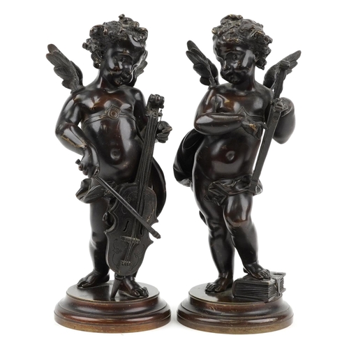 70 - Pair of 19th century Grand Tour classical patinated bronze figures of Putti playing instruments, the... 
