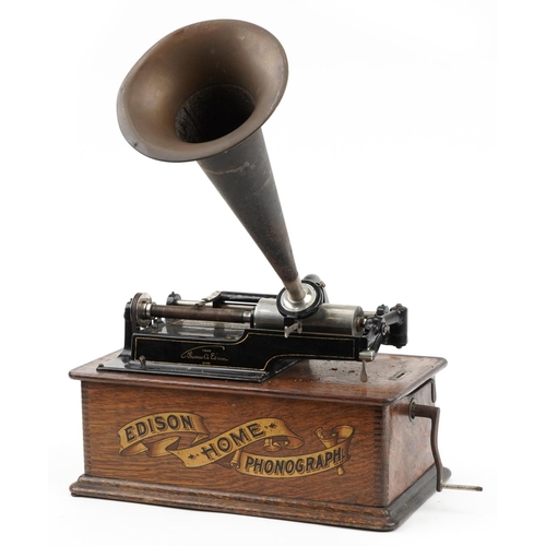 130 - Thomas Edison, 19th century oak cased Edison Home Phonograph with tin horn, numbered 154973, 30cm H ... 