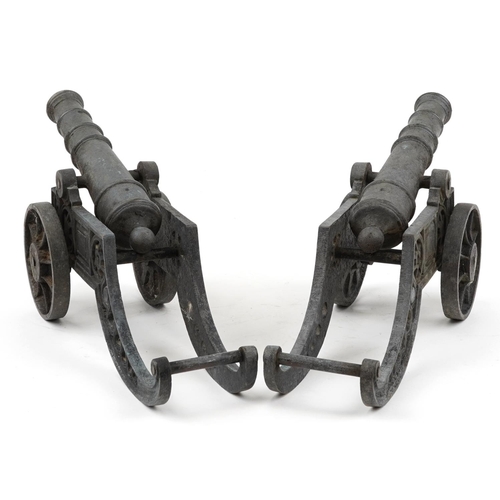 200 - Pair of naval interest 19th century style bronze and cast iron table cannons, each 47cm in length