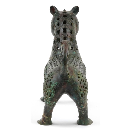 243 - Persian verdigris patinated bronze openwork mythical cat, 31cm in length