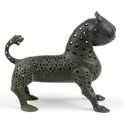 243 - Persian verdigris patinated bronze openwork mythical cat, 31cm in length