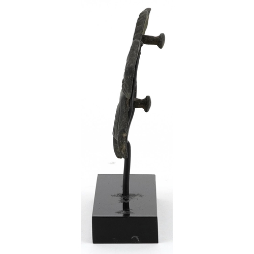 387 - Persian Luristan patinated bronze mythical animal handle, the largest 14cm high