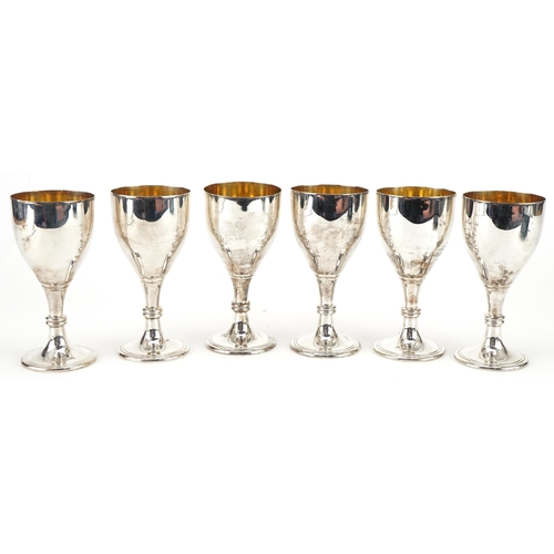 189 - Poston Products Ltd, set of six Elizabeth II silver chalices with gilt interiors, Birmingham 1973, 1... 