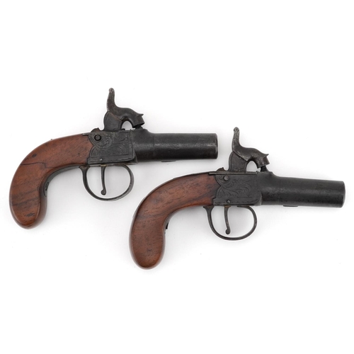 2513 - Pair of 19th century percussion muff pistols with engraved plates, housed in a fitted velvet lined b... 