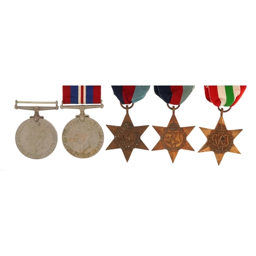 2398 - Five British military World War II medals including Italy and 1939-45 stars