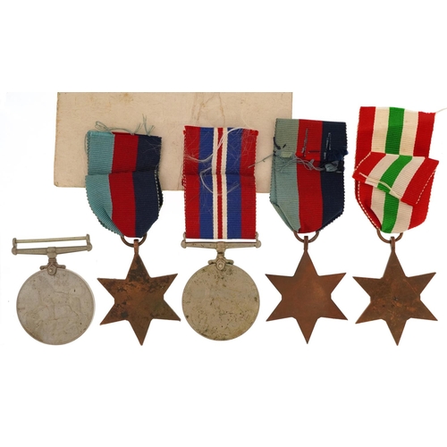 2398 - Five British military World War II medals including Italy and 1939-45 stars