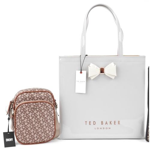 2357 - Three as new ladies bags comprising Ted Baker tote bag, DKNY tote bag and DKNY messenger bag