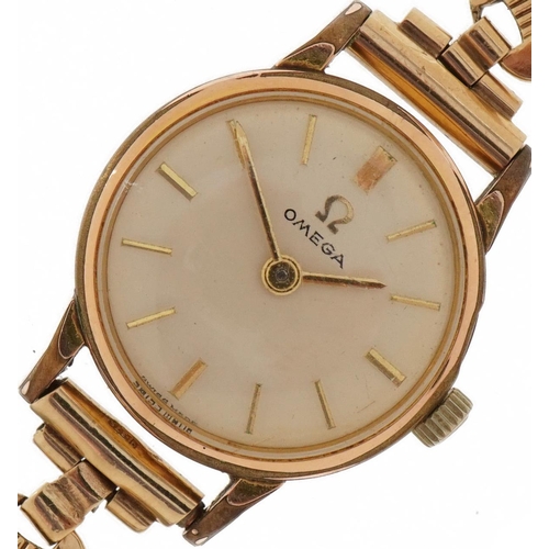 3913 - Omega, ladies 9ct gold wristwatch with 9ct gold strap with box, 20mm in diameter, total weight 14.0g