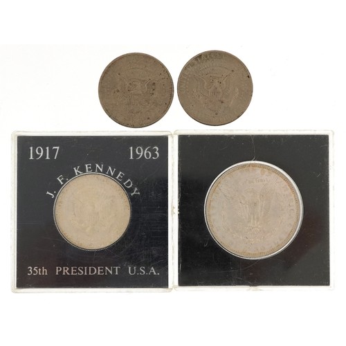 2572 - United States of America coinage including 1879 silver dollar and three half dollars