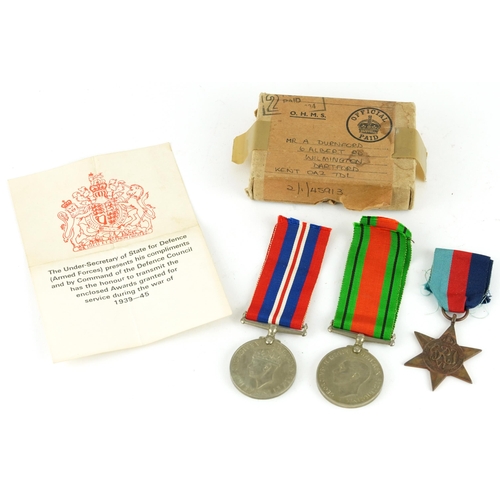 2395 - British military World War II three medal group with box of issue inscribed Mr A Durnford