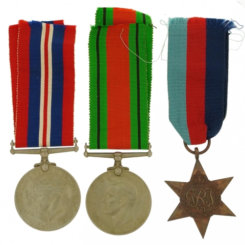 2395 - British military World War II three medal group with box of issue inscribed Mr A Durnford