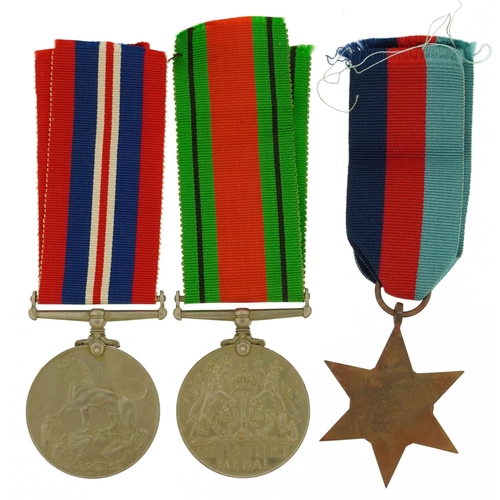 2395 - British military World War II three medal group with box of issue inscribed Mr A Durnford