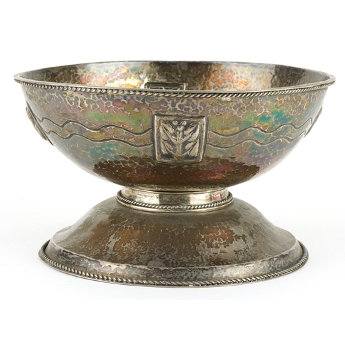 23 - Arts & Crafts circular unmarked hammered silver pedestal bowl embossed with stylised flowers and eng... 