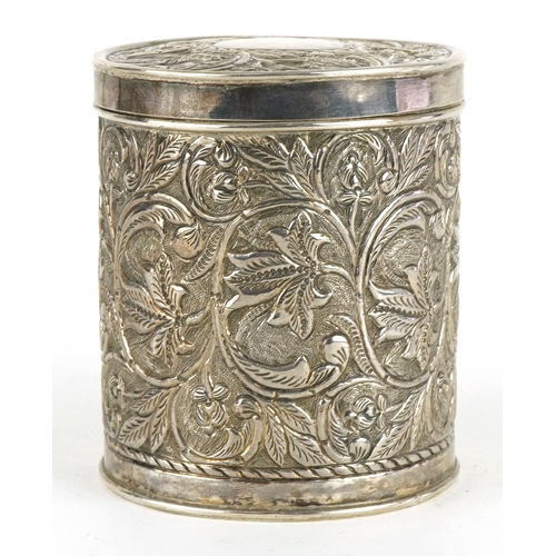 462 - Anglo Indian cylindrical box and cover profusely embossed with flowers and foliage, engraved from P ... 