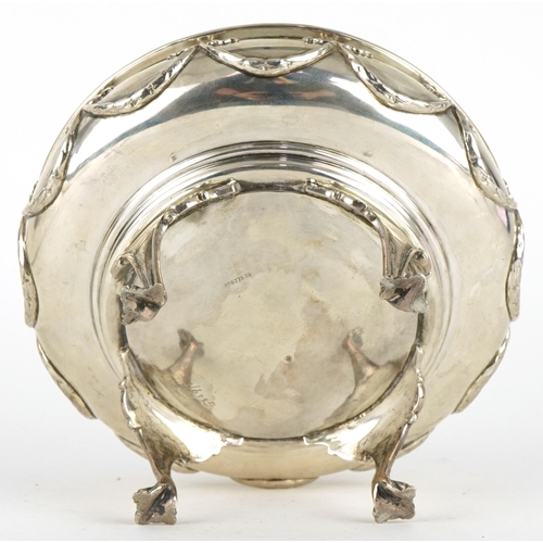 269 - Edward Souter Barnsley & Co, George VI circular silver bowl raised on four claw feet, cast with swag... 