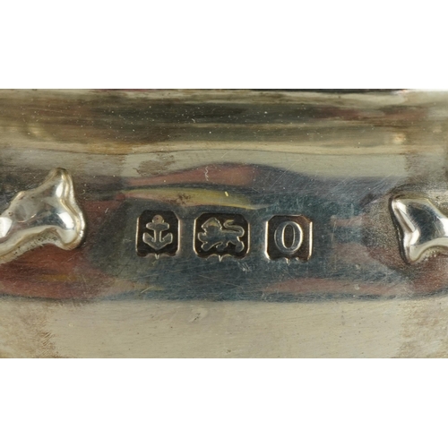 269 - Edward Souter Barnsley & Co, George VI circular silver bowl raised on four claw feet, cast with swag... 