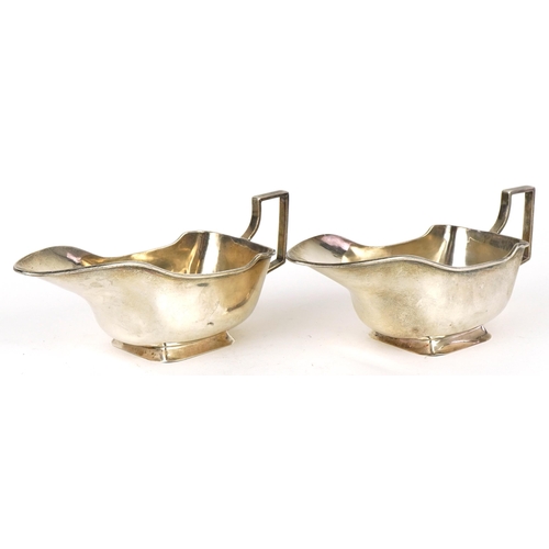 398 - Jones & Crompton, pair of Art Deco silver sauceboats, Birmingham 1929, 18cm in length, 228.2g