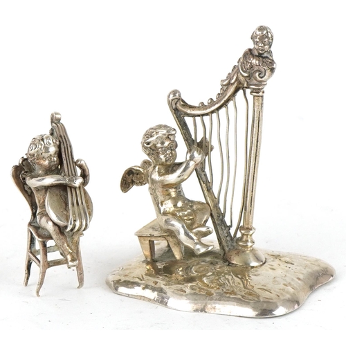 304 - Two Victorian and later miniature silver figures of Putti playing musical instruments, one Chester 1... 